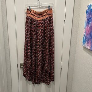 Anthropologie Black and Orange Floral Maxi pants
